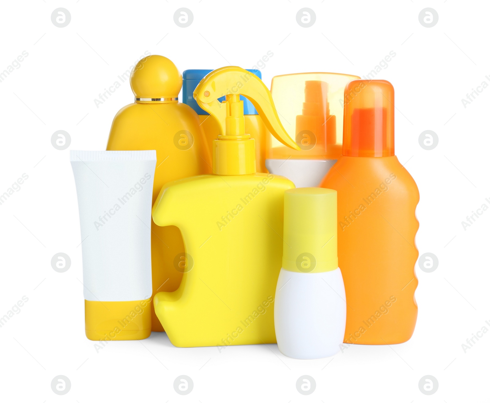 Photo of Many different suntan products on white background