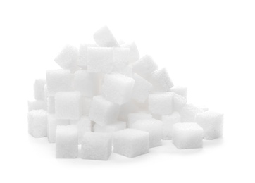 Photo of Heap of refined sugar cubes on white background