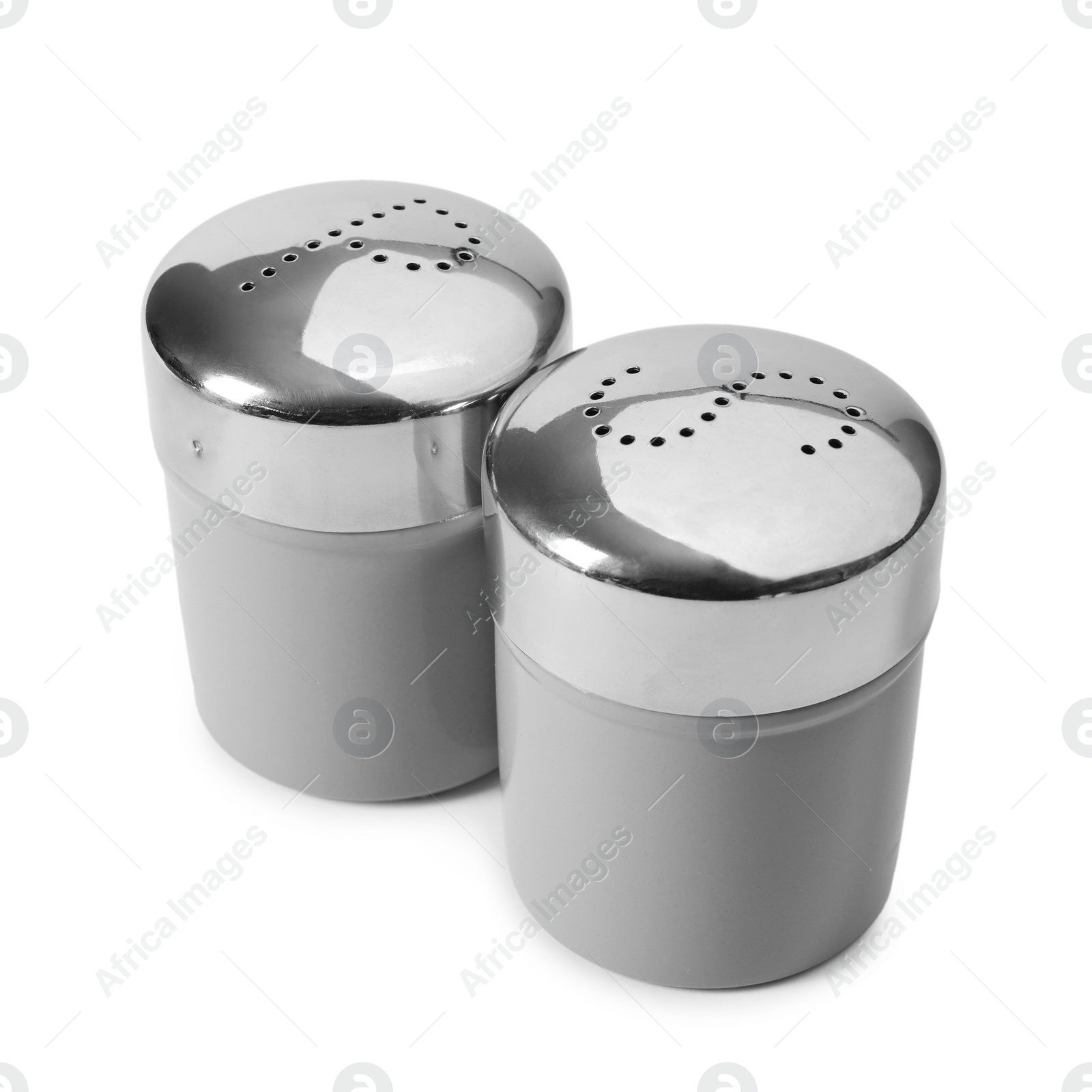 Photo of Salt and pepper shakers isolated on white