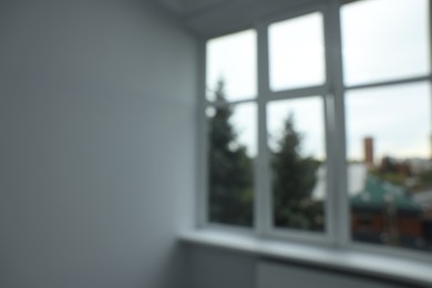 Blurred view of window in empty renovated room