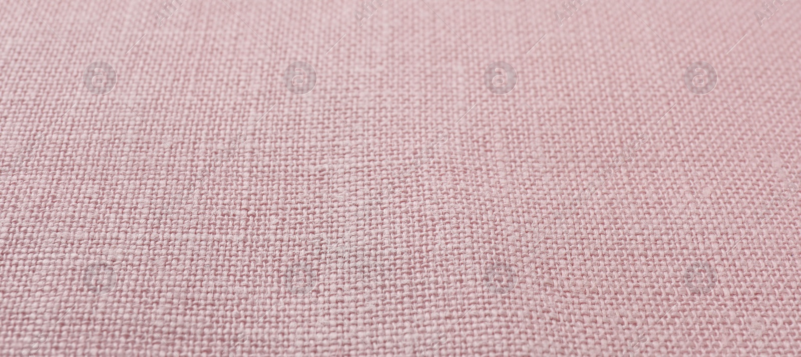 Photo of Texture of pink fabric as background, closeup