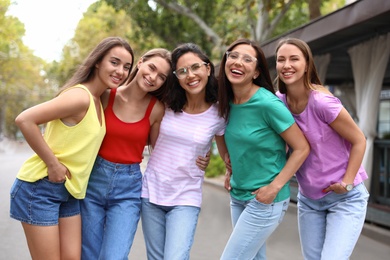 Happy women outdoors on sunny day. Girl power concept