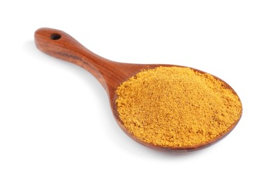 Curry powder in spoon isolated on white