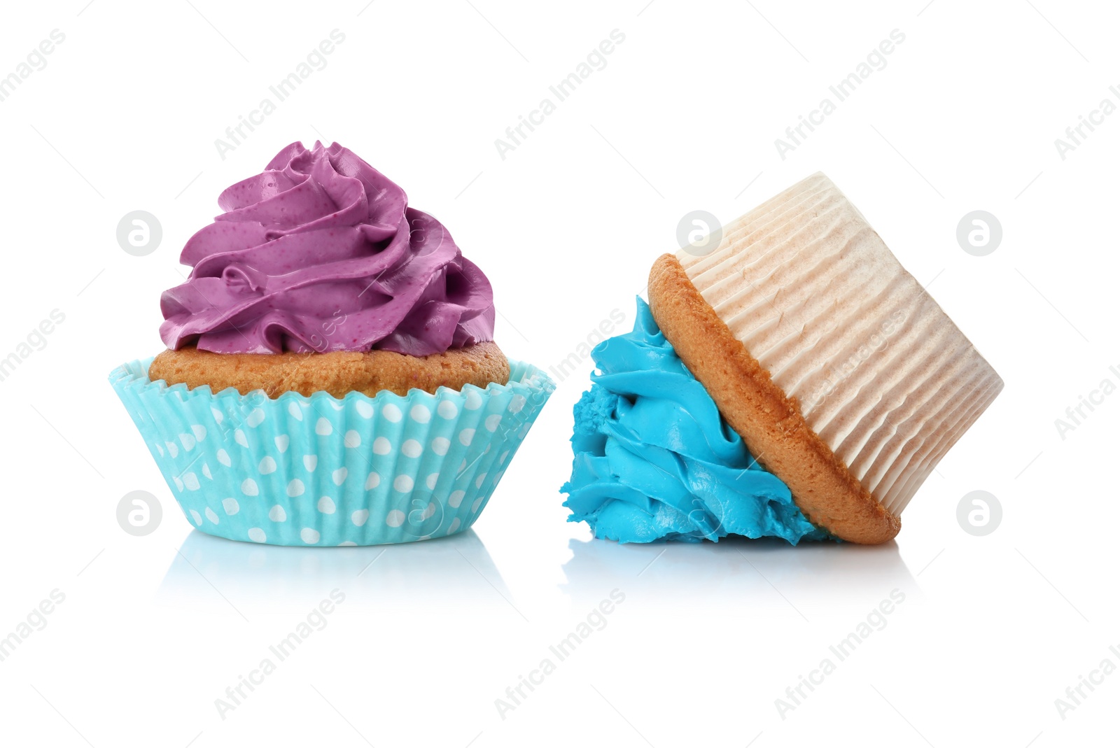 Photo of Dropped and good cupcakes on white background. Troubles happen