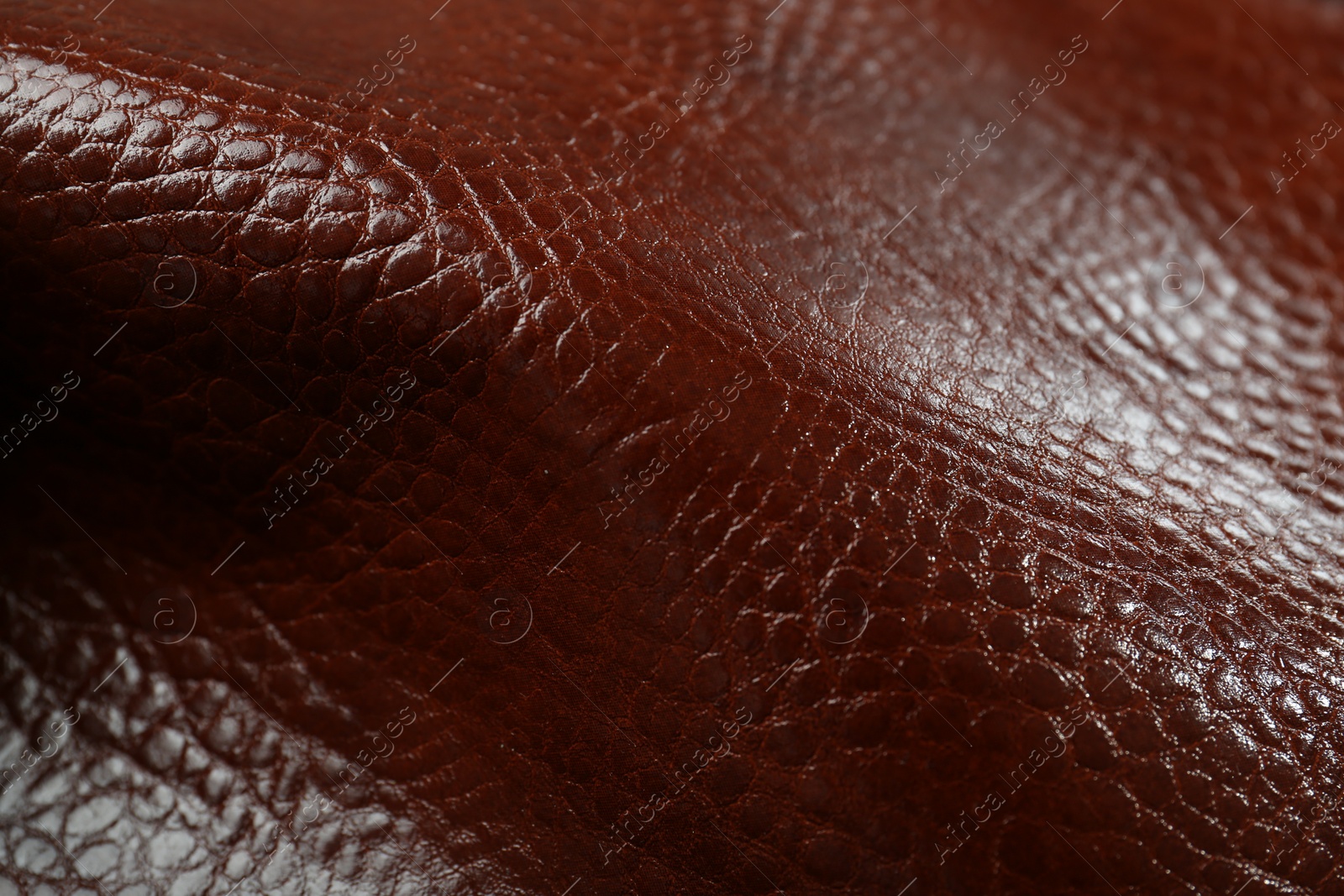 Photo of Beautiful red leather as background, closeup view