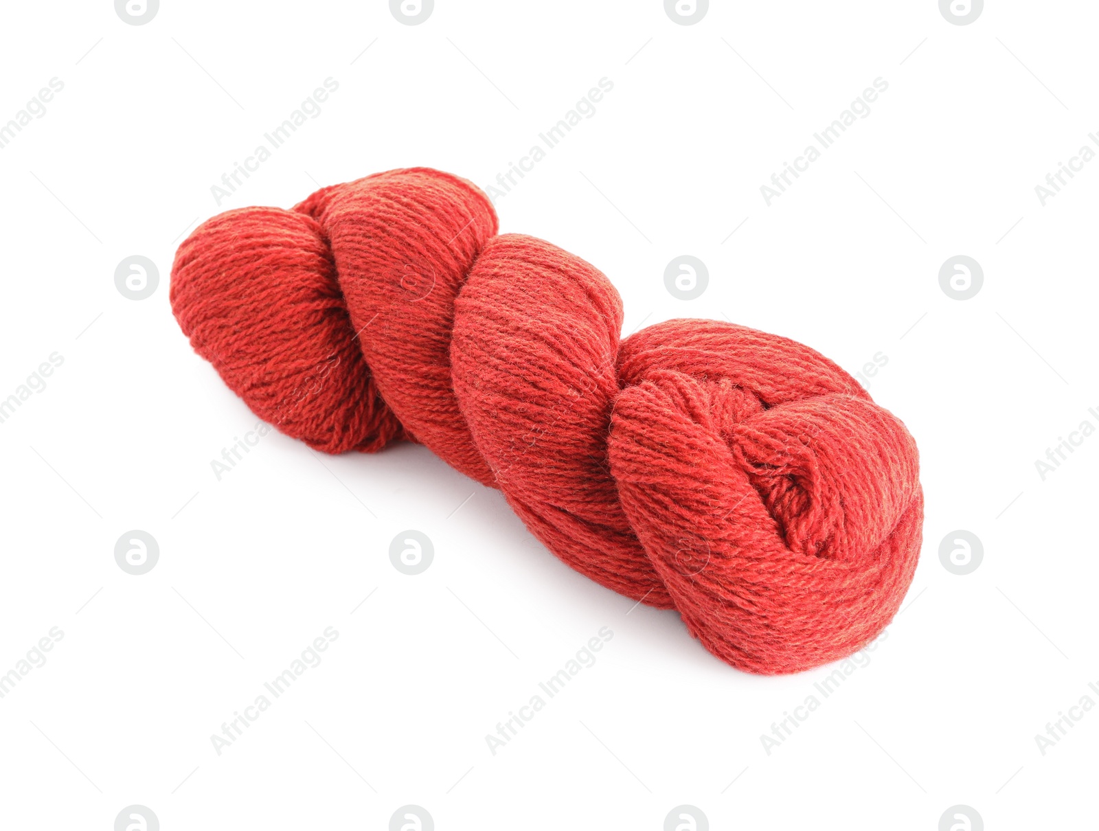 Photo of Soft red woolen yarn isolated on white