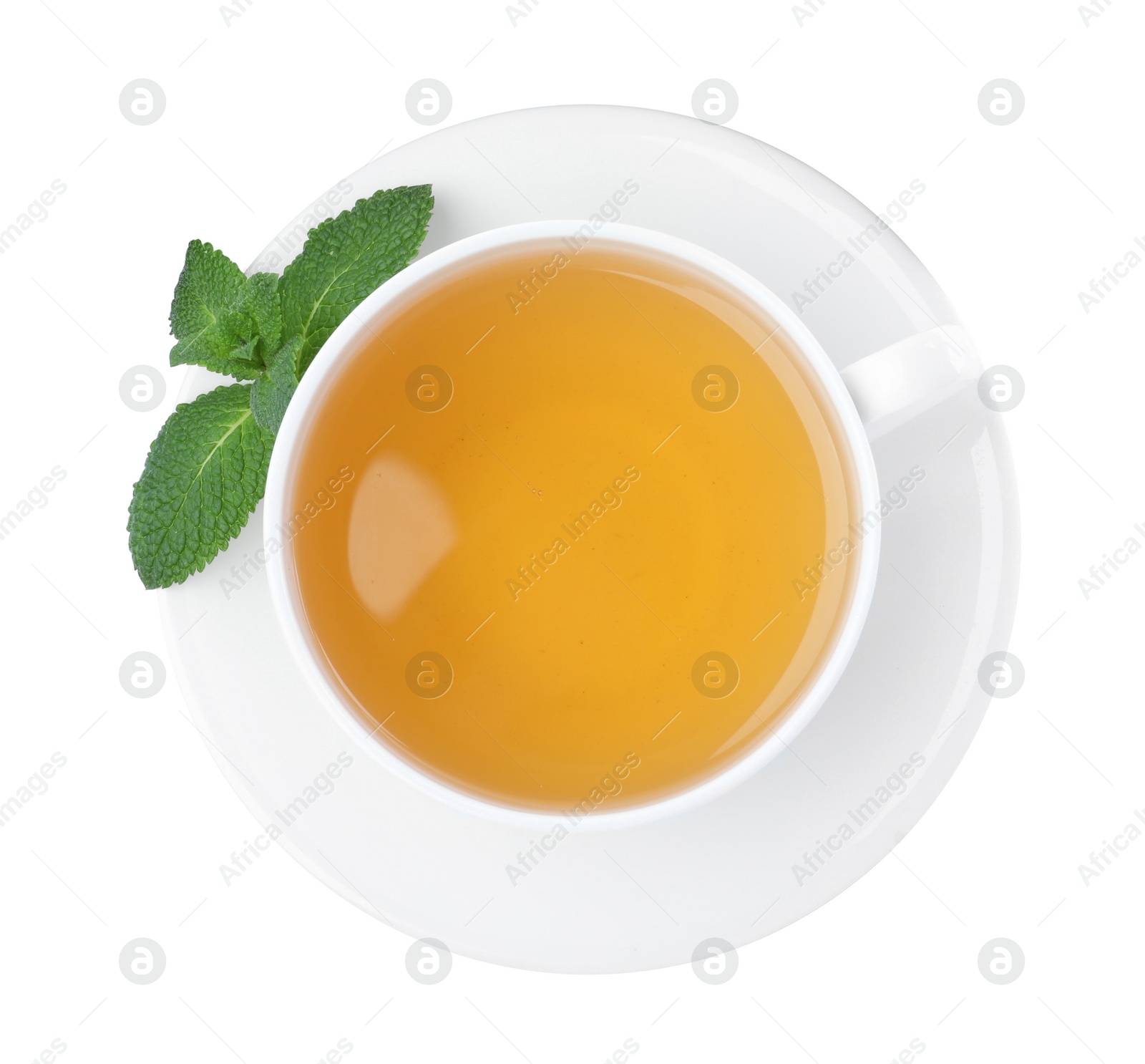 Photo of Cup of aromatic green tea with fresh mint on white background, top view