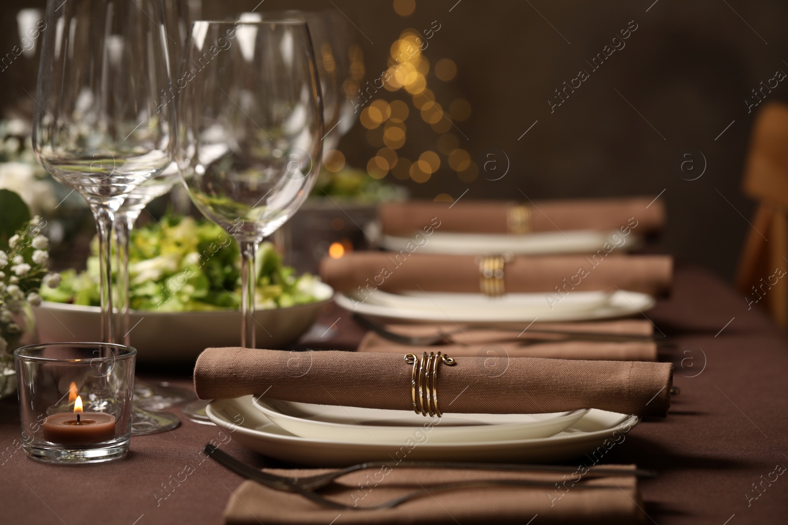 Photo of Stylish elegant table setting for festive dinner in restaurant