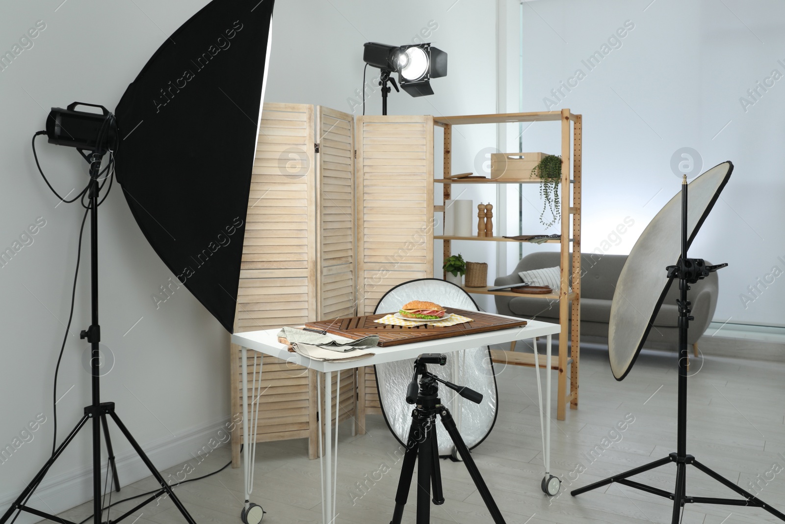 Photo of Tasty sandwich on table in photo studio. Food photography