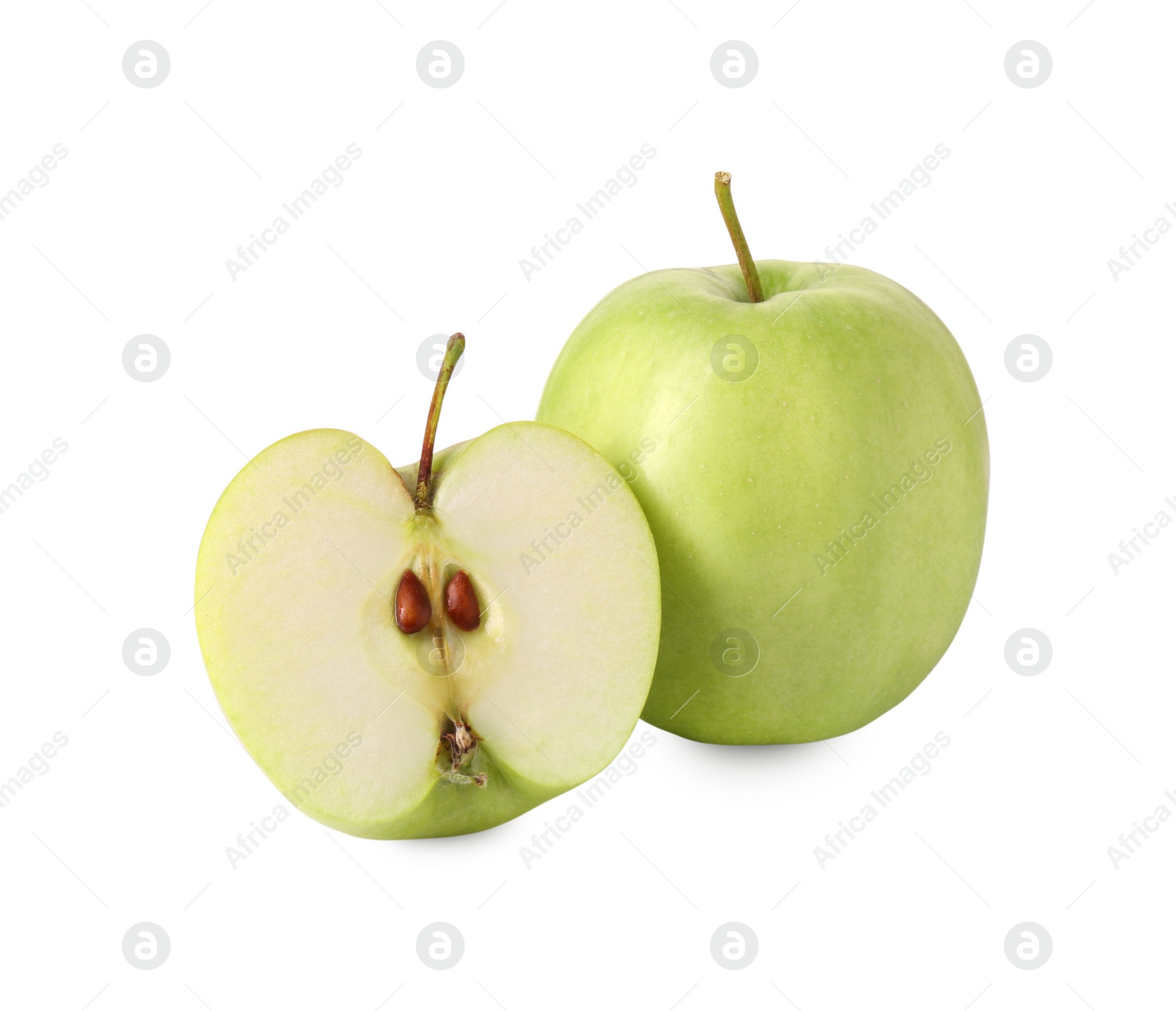 Photo of Whole and cut green apples isolated on white