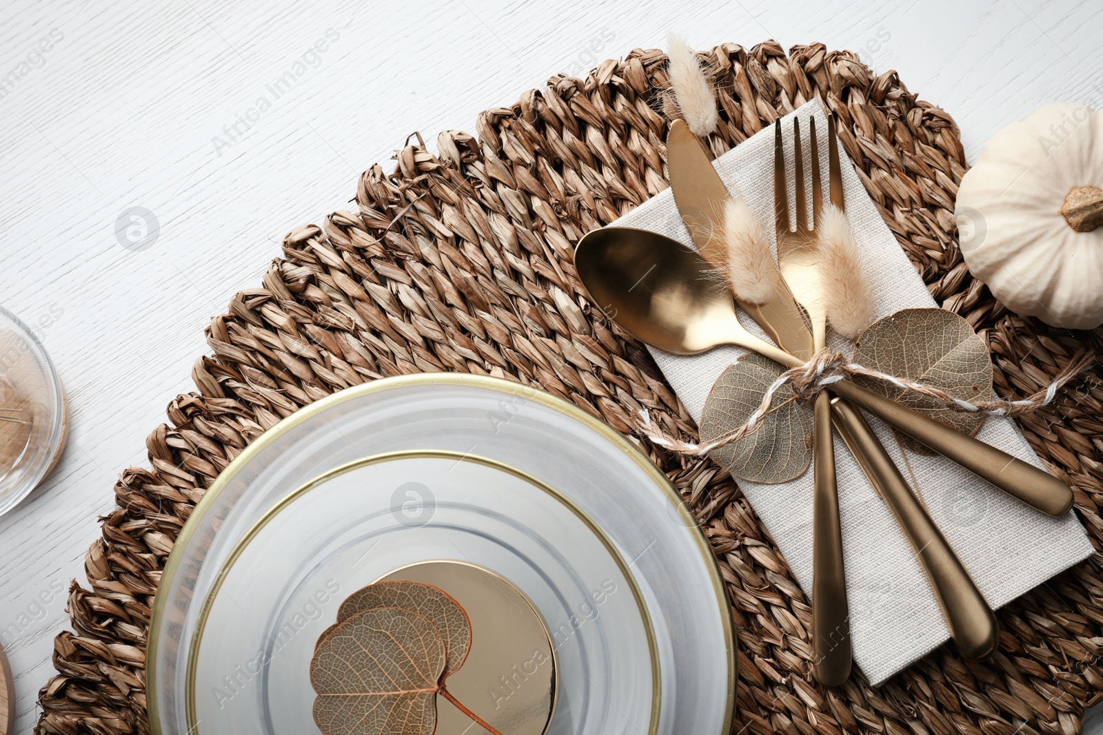 Photo of Autumn table setting with pumpkin on white wooden background, flat lay