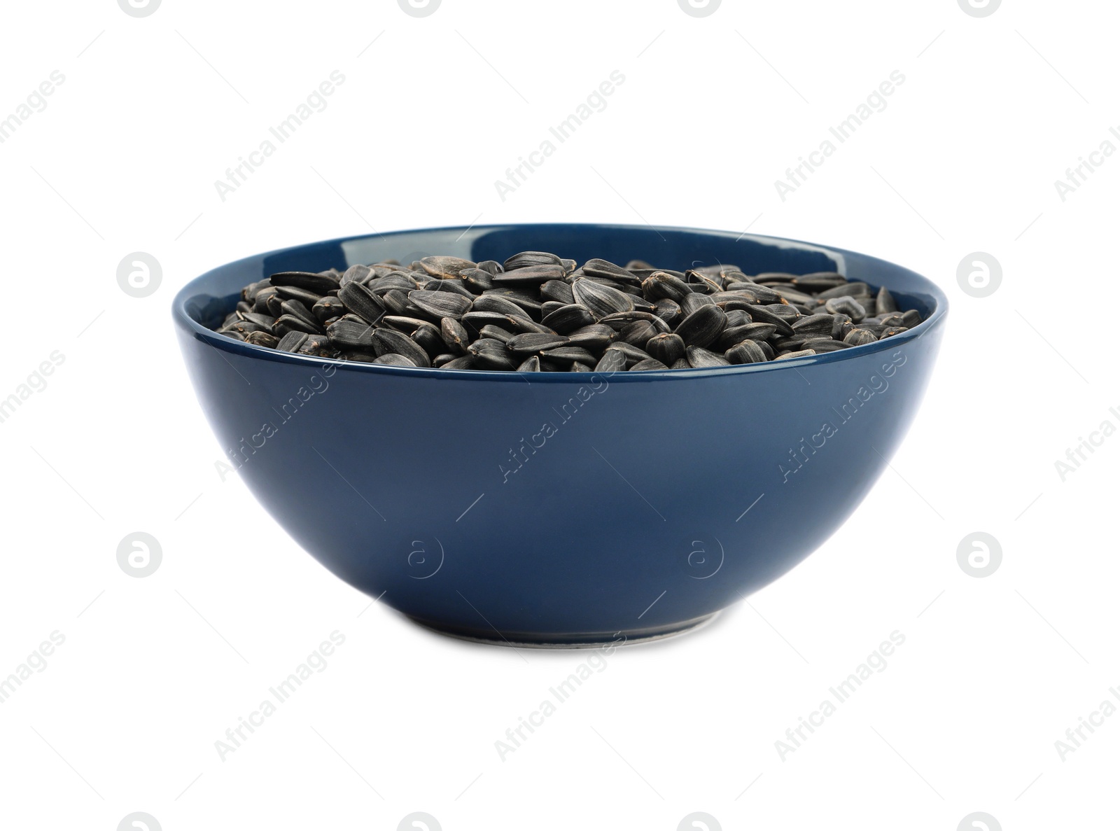 Photo of Sunflower seeds in bowl isolated on white