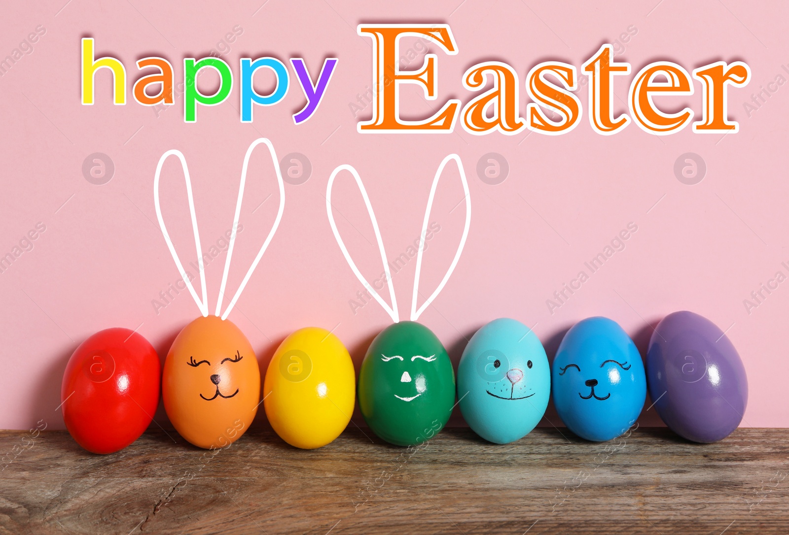 Image of Happy Easter. Two eggs with drawn faces and ears as bunnies among others on wooden table against pink background