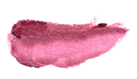 Photo of Smear of beautiful lipstick on white background, top view