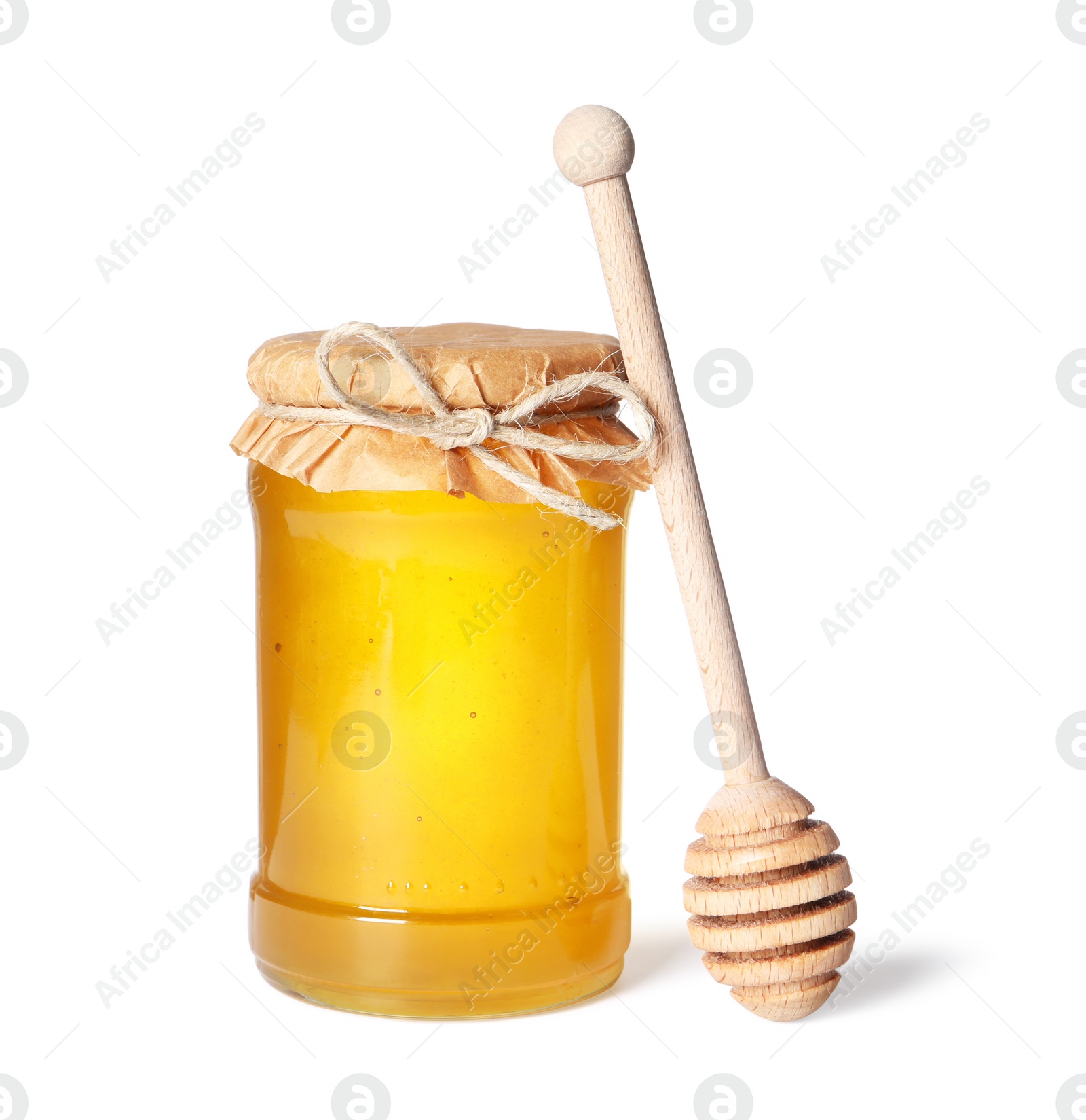 Photo of Tasty natural honey in glass jar and dipper isolated on white