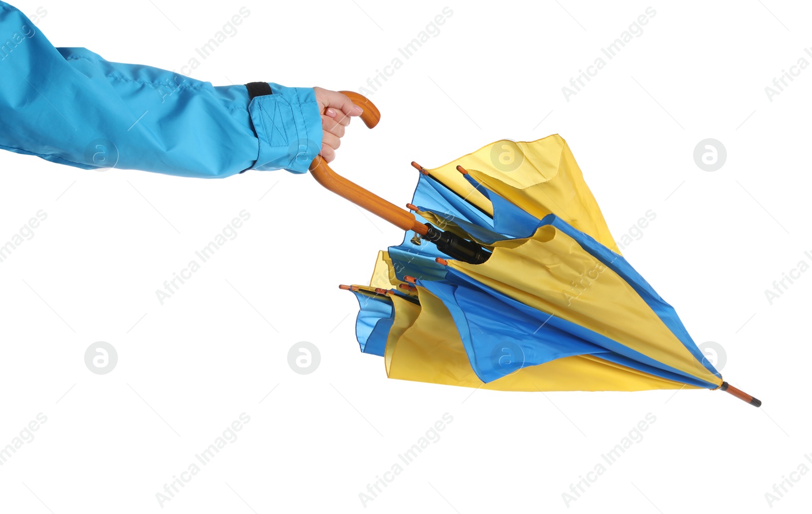 Photo of Woman with closed bright umbrella on white background, closeup