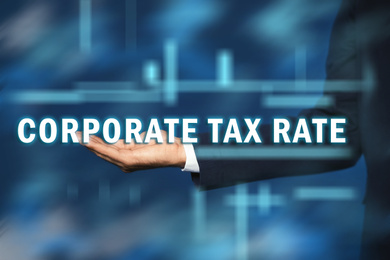 Image of Corporate tax rate. Man against color background, closeup