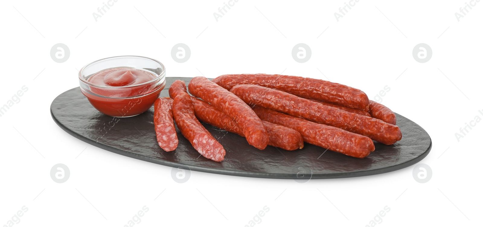 Photo of Thin dry smoked sausages served with ketchup isolated on white