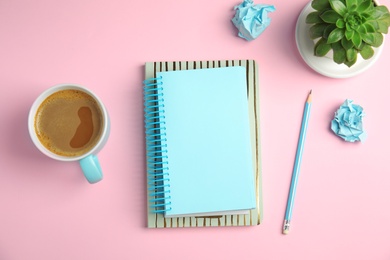 Photo of Flat lay composition with notebooks and coffee on color background