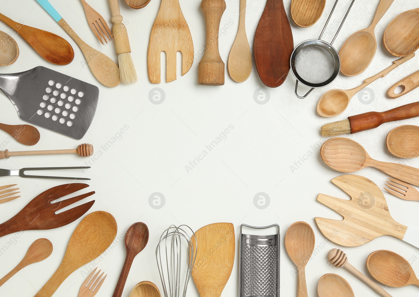 Photo of Frame of cooking utensils on white background, flat lay. Space for text
