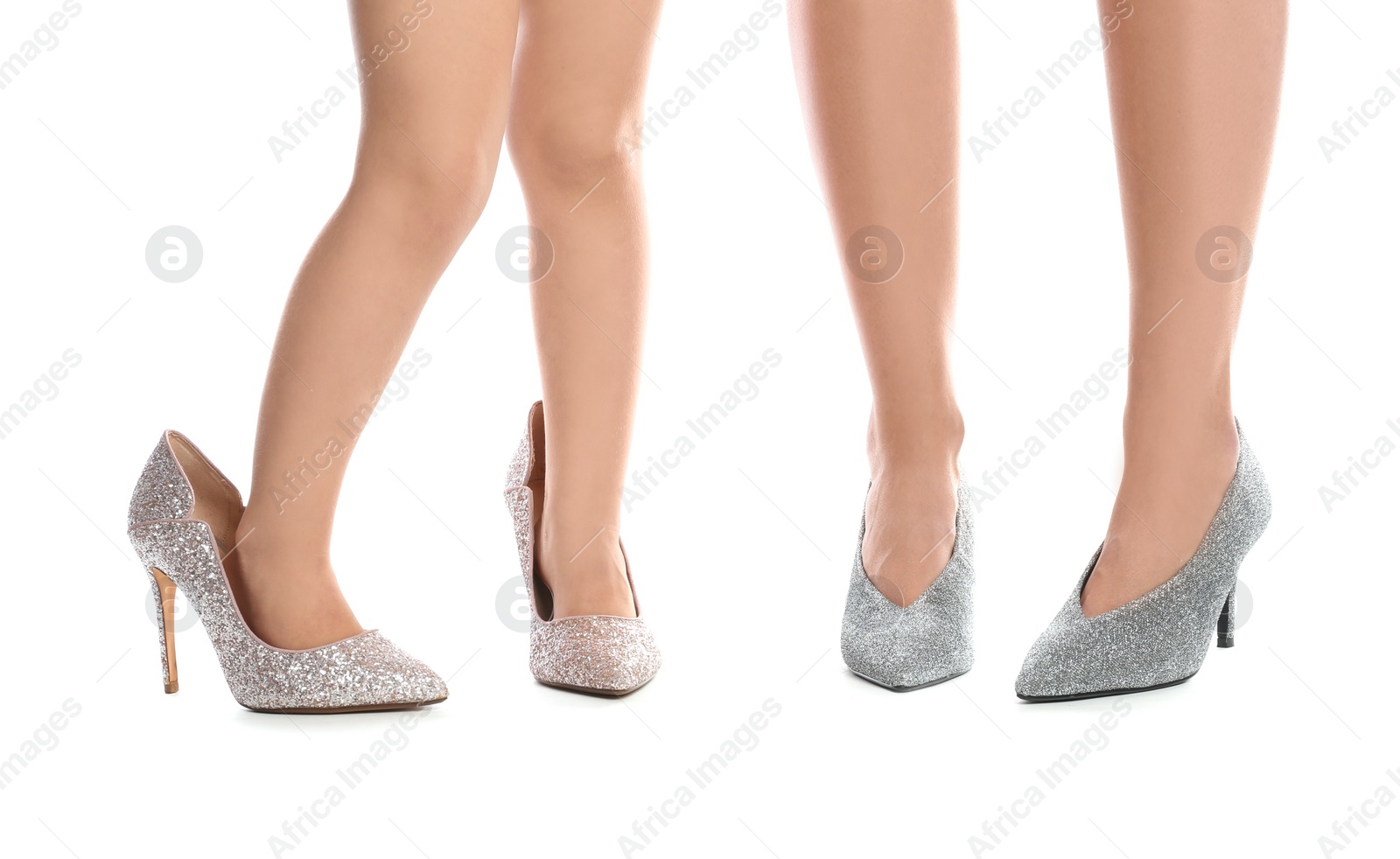 Photo of Mother and daughter in high heeled shoes on white background, closeup on legs