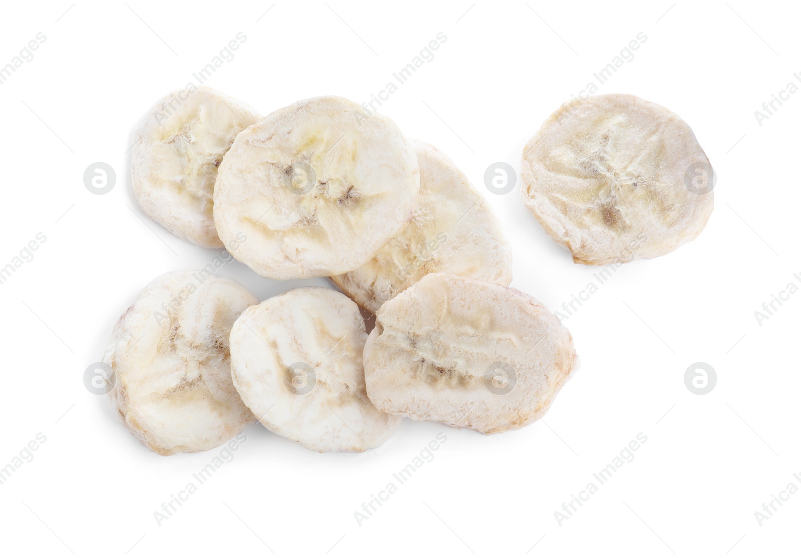 Photo of Pile of freeze dried bananas on white background, top view