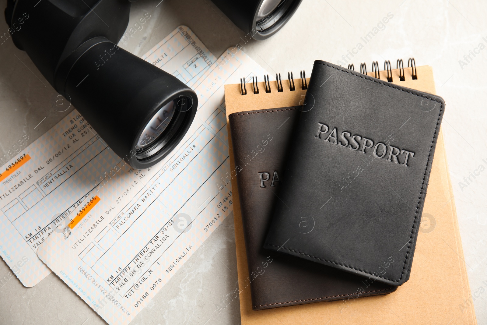 Photo of Flat lay composition with tourist items on grey background. Travel agency