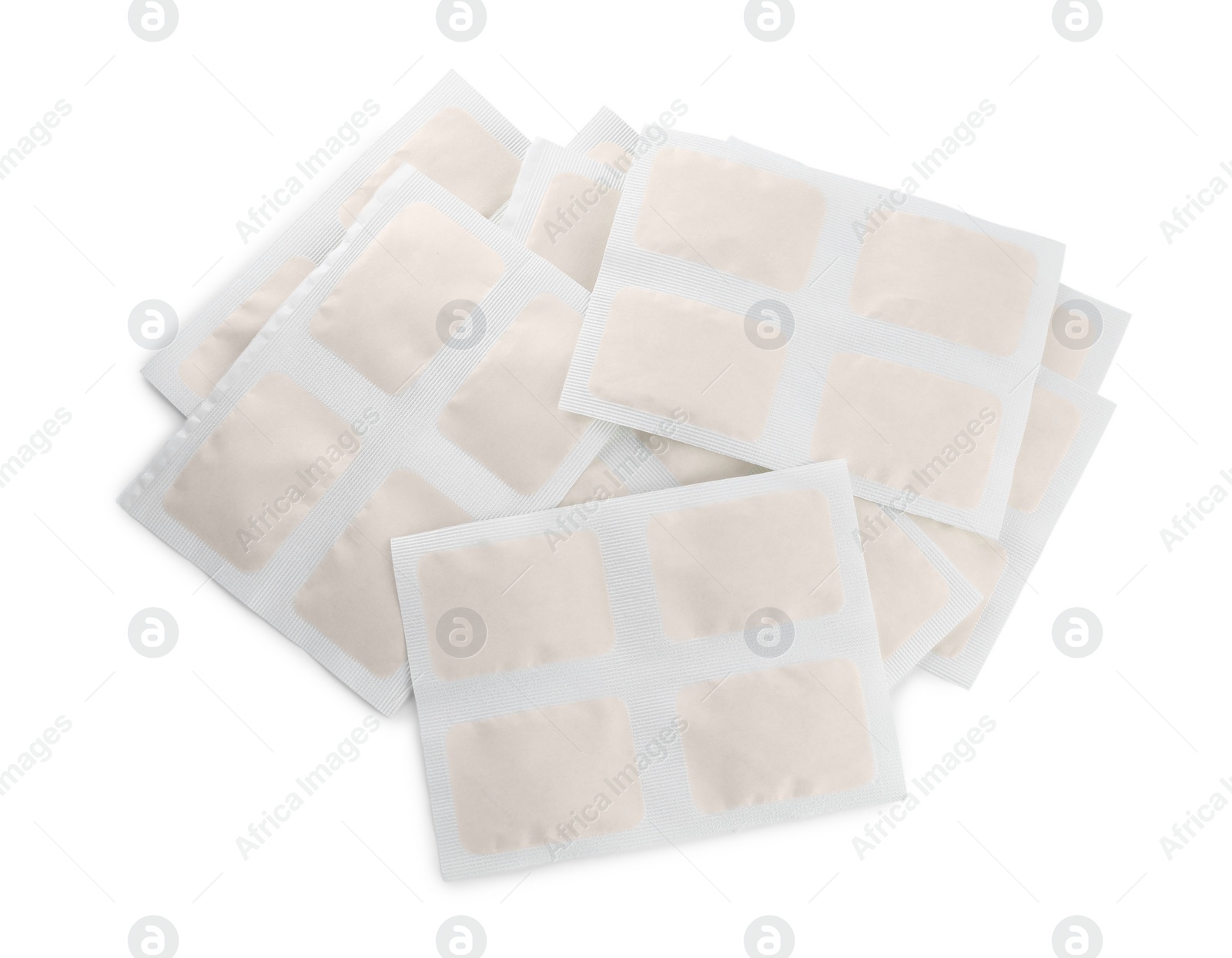 Photo of Pile of mustard plasters on white background, top view
