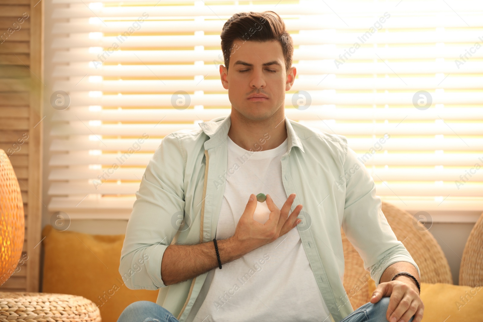 Photo of Man during self-healing session in therapy room