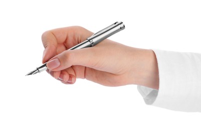 Woman holding stylish fountain pen on white background, closeup