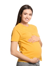 Photo of Young pregnant woman in casual clothes on white background