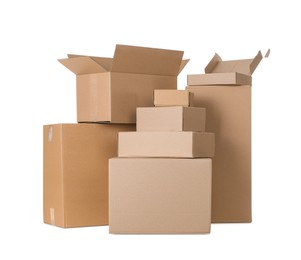 Photo of Pile of cardboard boxes on white background