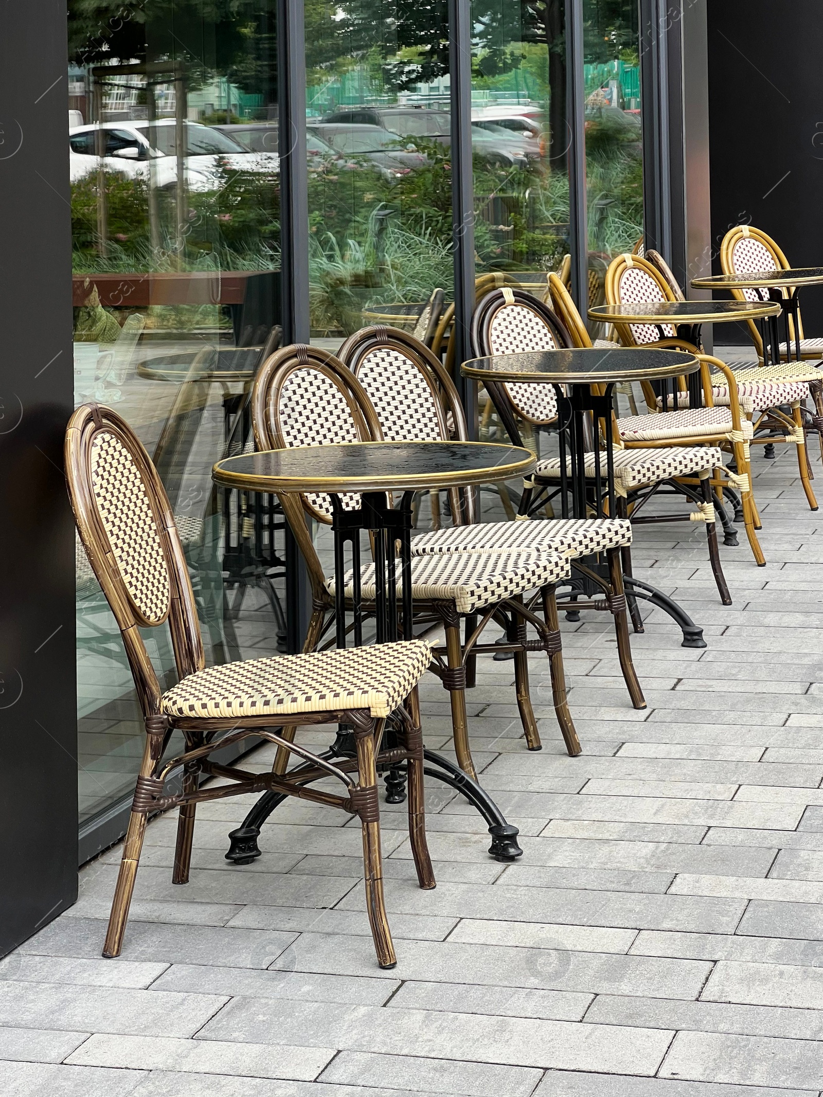 Photo of View of outdoor cafe terrace on city street