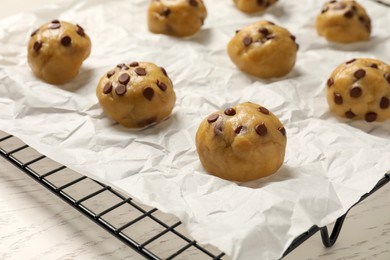 Uncooked chocolate chip cookies on table, closeup