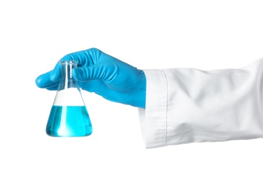 Photo of Scientist holding glass flask with liquid on white background. Chemical research