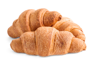 Photo of Tasty fresh crispy croissants isolated on white