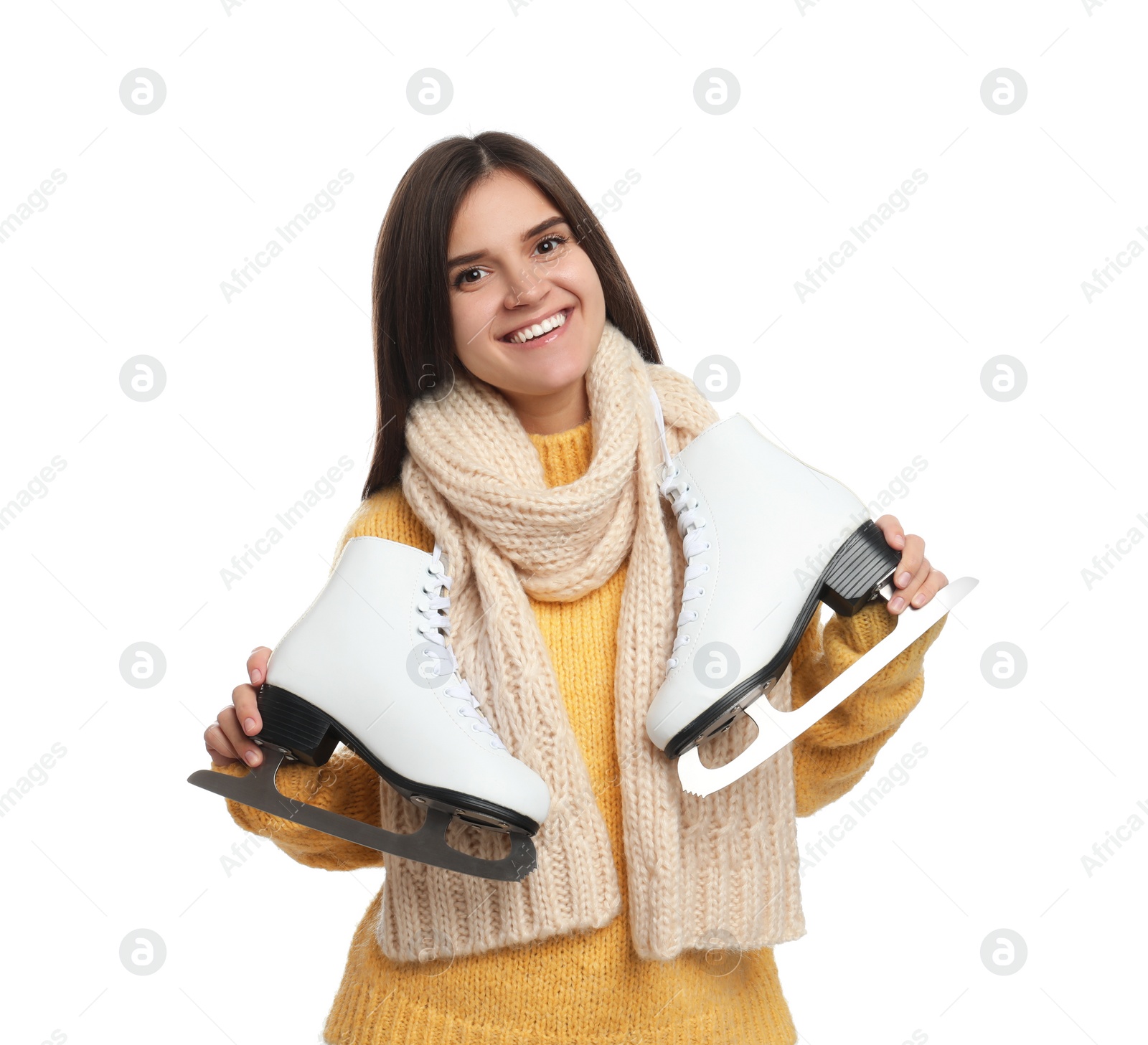 Photo of Happy woman with ice skates on white background