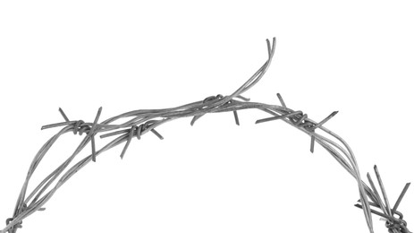 Photo of Shiny metal barbed wire isolated on white