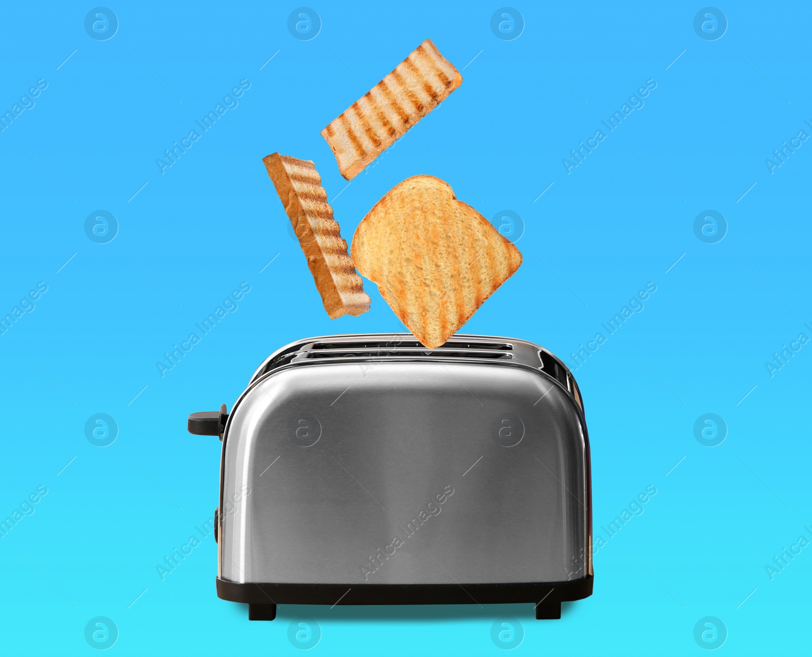 Image of Slices of grilled wheat bread flying out of toaster on color background 