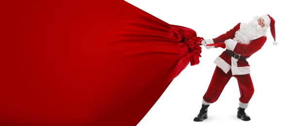 Santa Claus pulling enormous red bag full of Christmas gifts on white background. Banner design