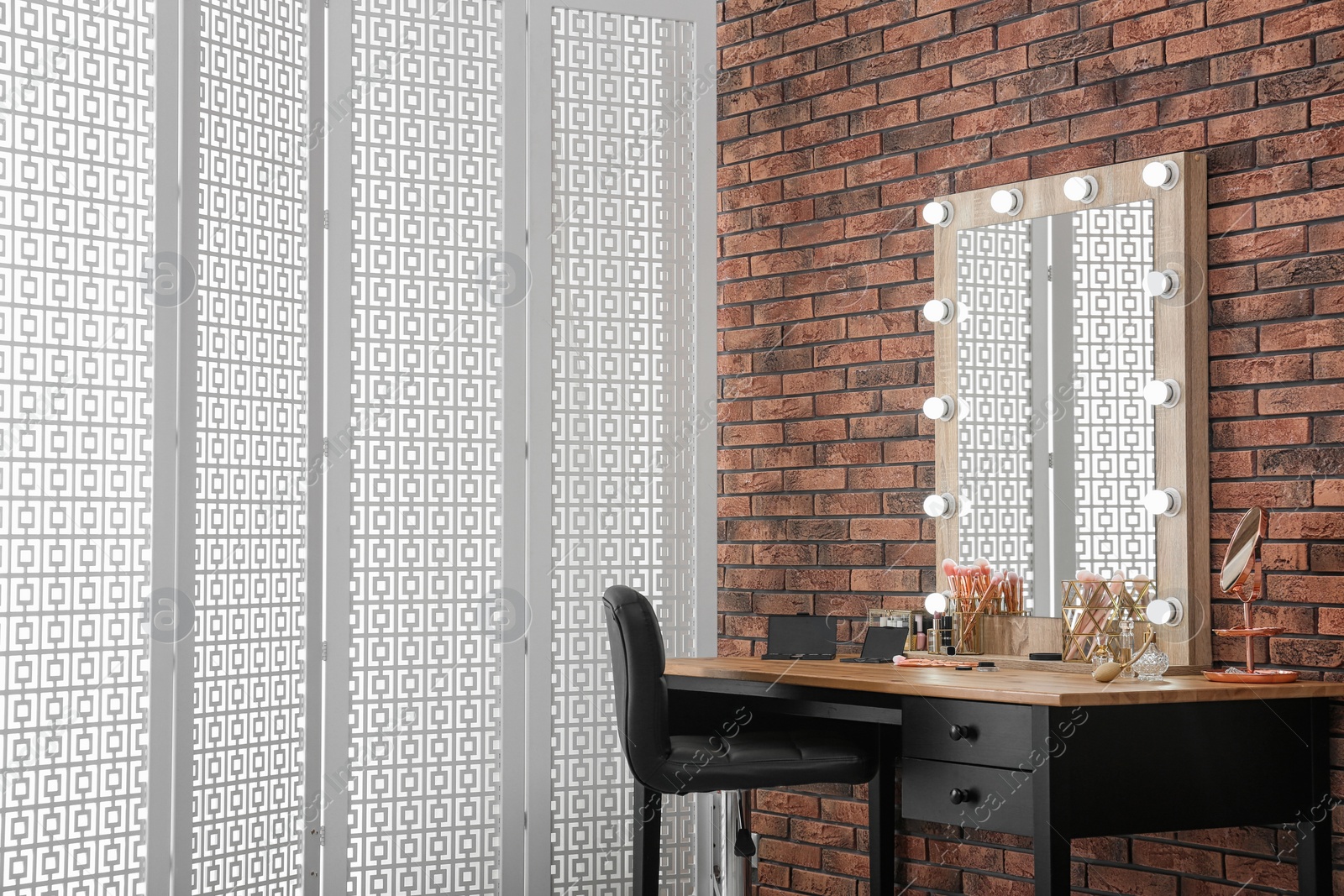 Photo of Dressing table with mirror in makeup room interior