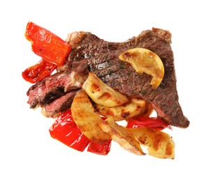 Photo of Delicious grilled beef steak with vegetables and lemon isolated on white, top view