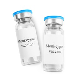 Monkeypox vaccine in glass vials on white background, top view