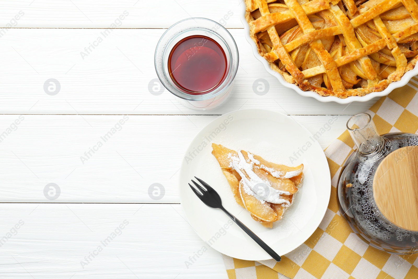 Photo of Piece of tasty homemade quince pie with powdered sugar served on white wooden table, flat lay. Space for text