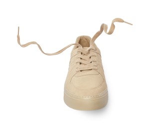 Photo of One stylish beige sneaker isolated on white