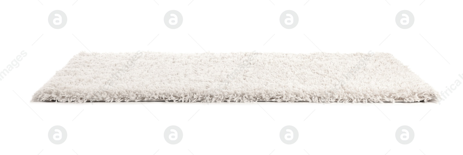 Photo of Fuzzy carpet on white background. Interior element