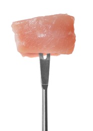 Photo of Fondue fork with piece of raw meat isolated on white