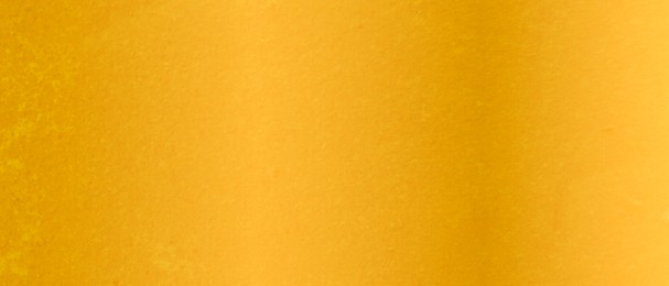 Image of Shiny gold surface as background, closeup view