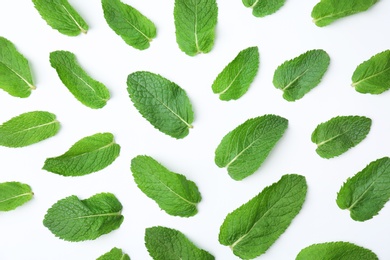 Photo of Flat lay composition with fresh green mint leaves on white background