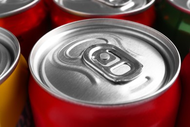 Photo of Energy drinks in cans, closeup. Functional beverage